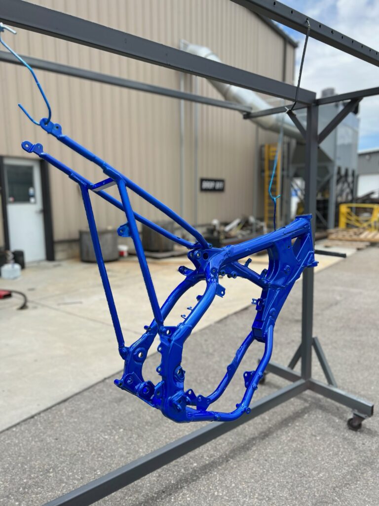 Custom motorcycle frame finished in blue